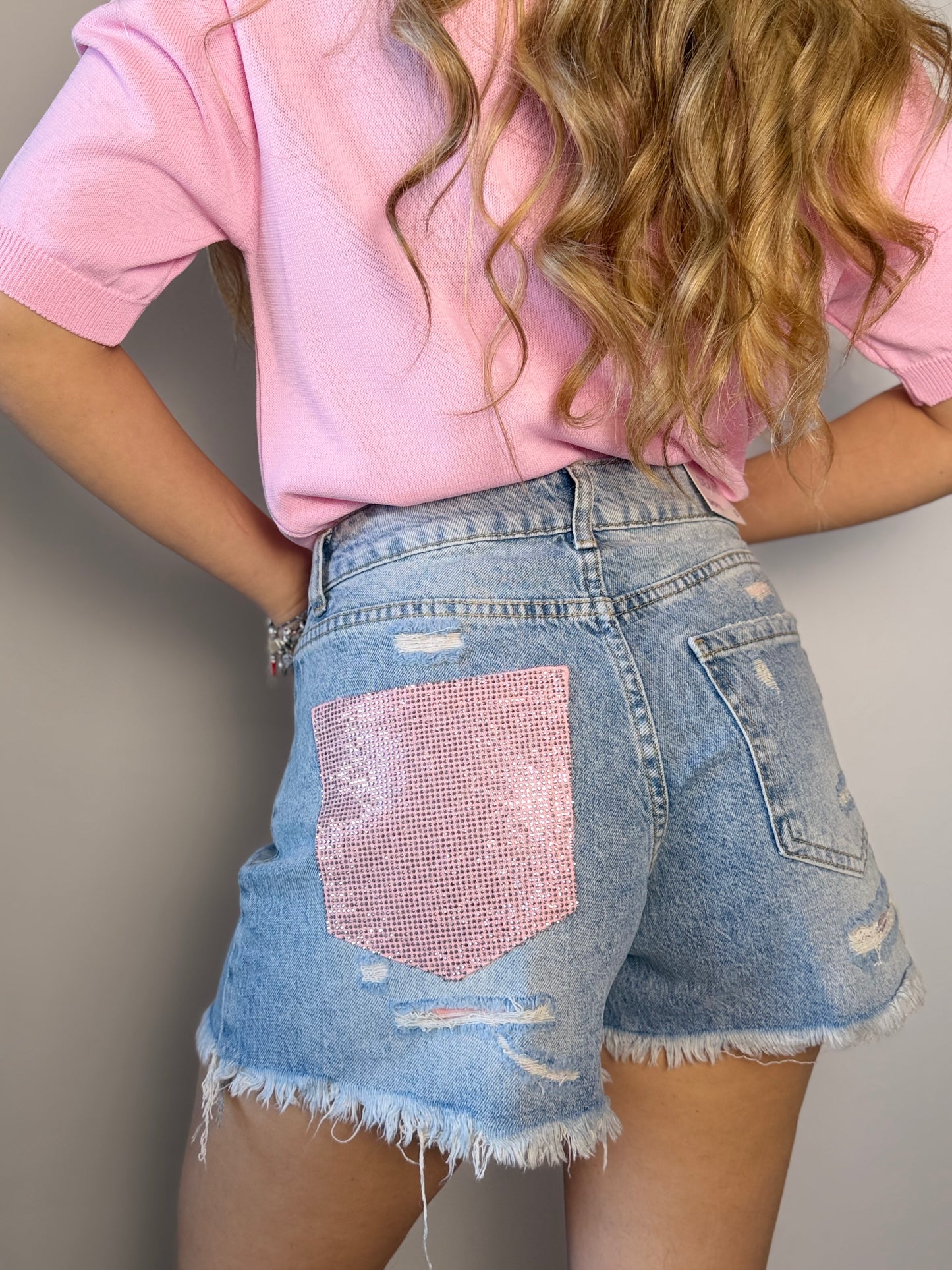 Shorts tasca rosa